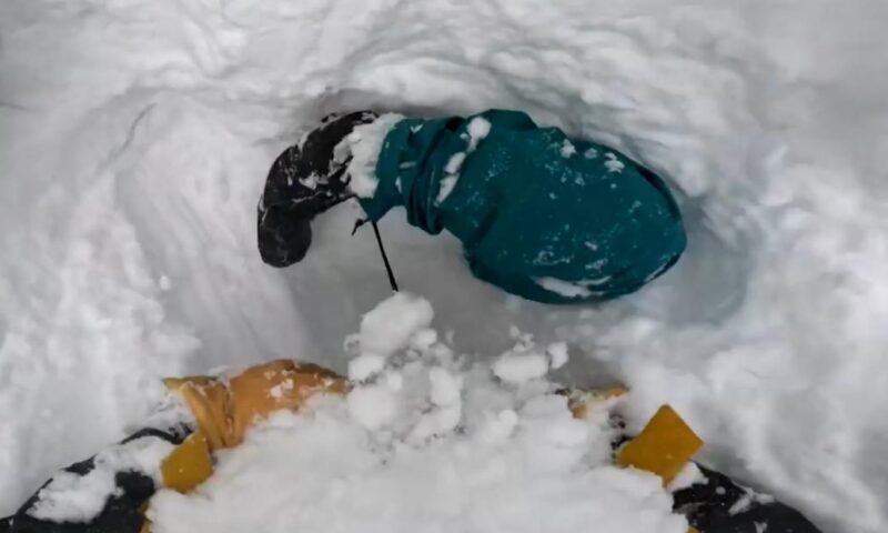 A snowboarder got buried upside down in snow. See skier’s quick reaction.