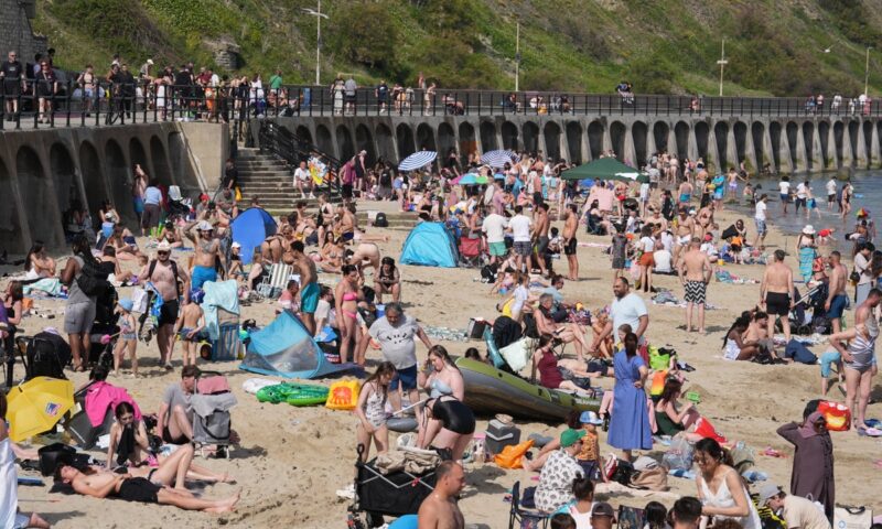 UK heatwave officially declared as temperatures top 32C on hottest day of the year so far