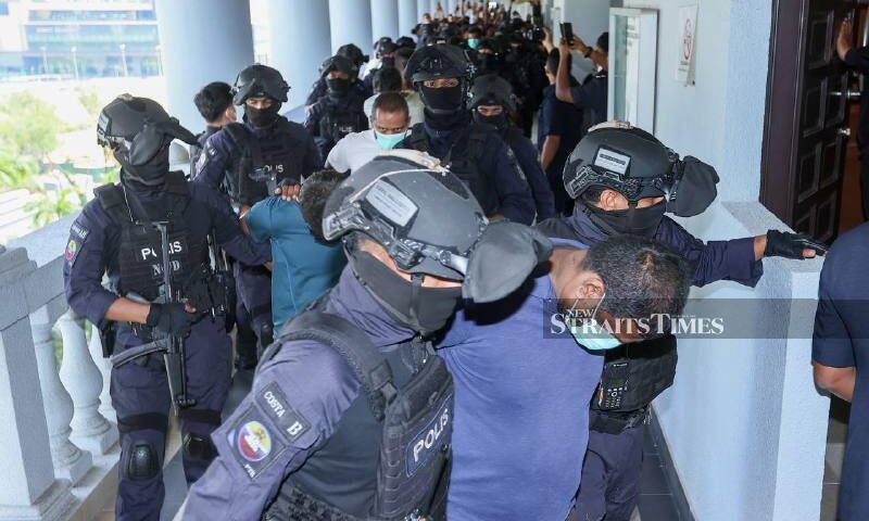 11 men charged over alleged organised crime group Geng RT6