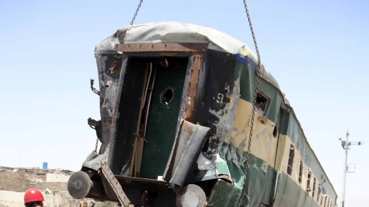 Pakistan attack kills at least 24 as explosive-laden car hits train
