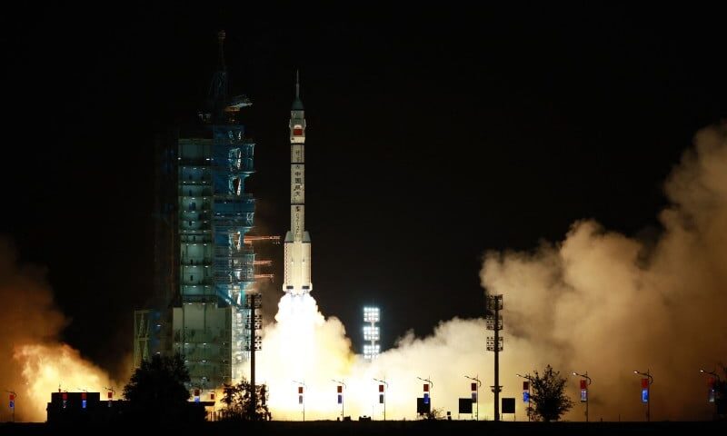 China launches three-crew space flight as part of Moon ambitions