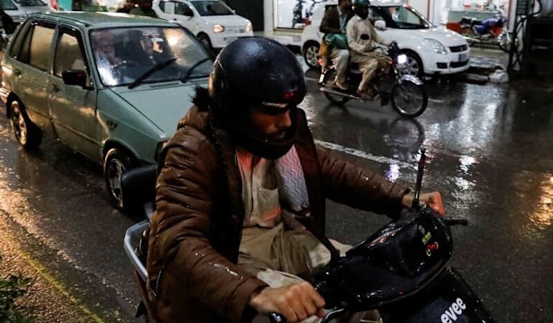 Pakistan commuters switch to EV scooters as petrol prices soar