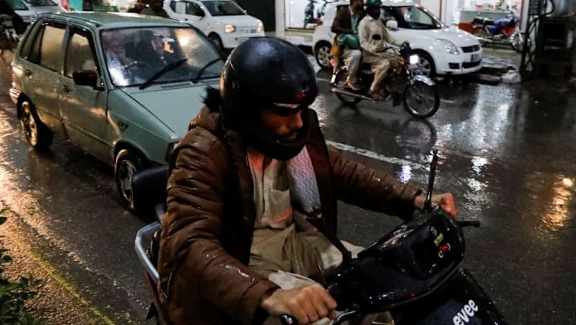 Pakistan commuters switch to EV scooters as petrol prices soar