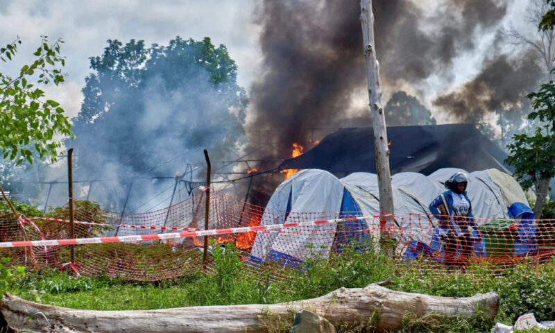 Eighteen suspected Ebola patients escape after treatment tent is set on fire for a second time in Congo