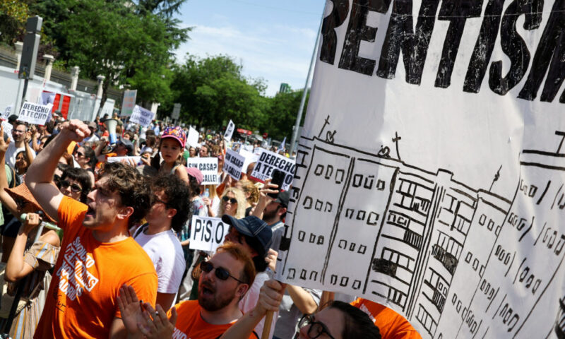 Thousands protest rising housing costs in Spain’s capital