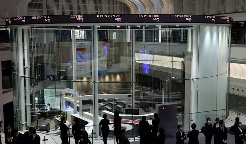 Japan’s Nikkei hits record high as chip-related shares jump