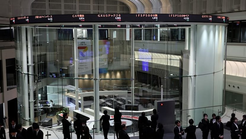 Japan’s Nikkei hits record high as chip-related shares jump