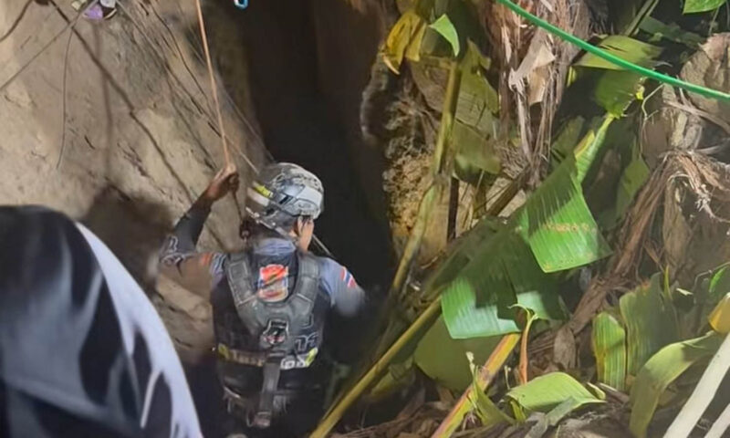 Man rescued after more than a week trapped in flooded cave in Laos