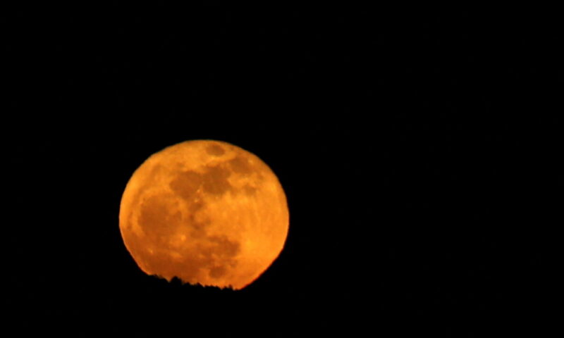 The Blue Micromoon Rises in Sunday’s Early Skies