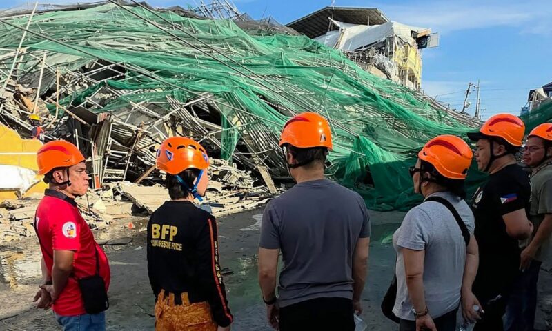 Two trapped people alive after Philippines building collapse, rescue continues