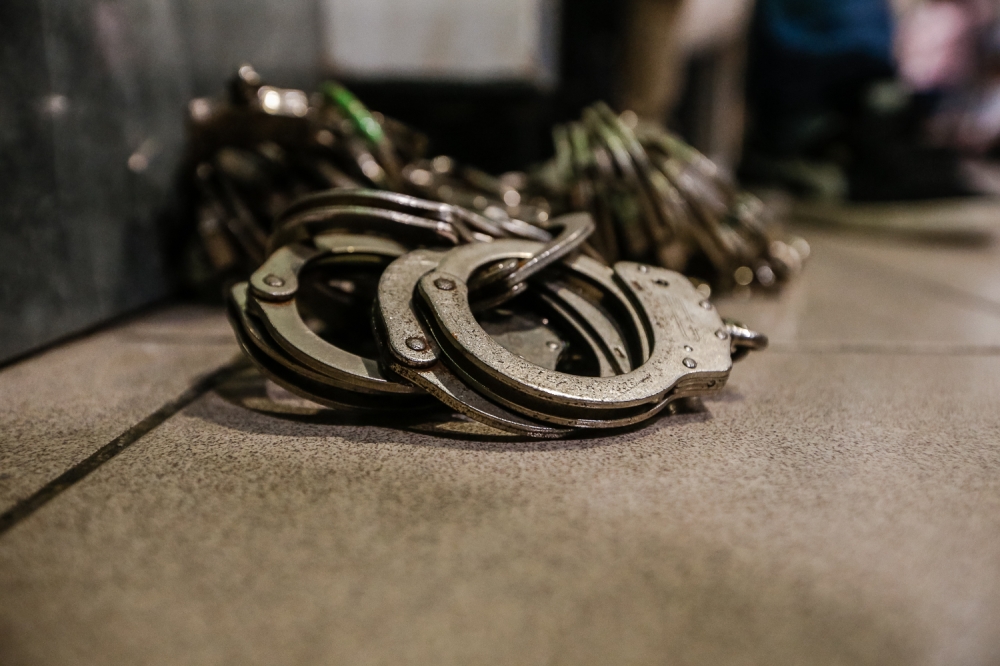 Police arrest eight, seize ketamine and ecstasy in KL hotel raid linked to a sudden death case
