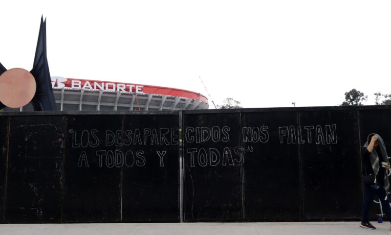Activists campaign for Mexico’s missing people near World Cup stadium