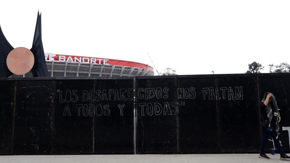 Activists campaign for Mexico’s missing people near World Cup stadium