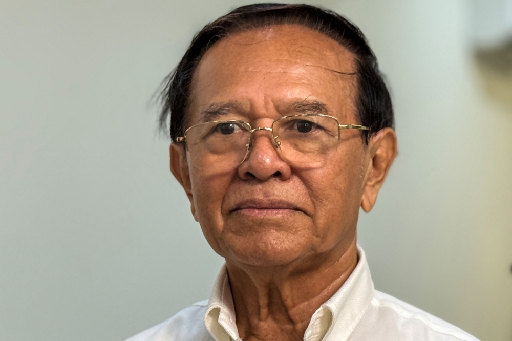 Cambodian king pardons former opposition leader