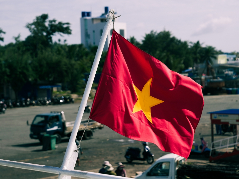 Vietnam arrests two over shooting of Australians in Ho Chi Minh