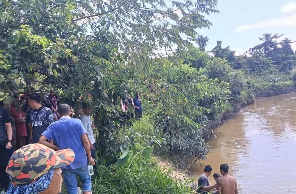 Search for boy, 10, who fell into Sungai Bernam expanded to three-kilometre radius
