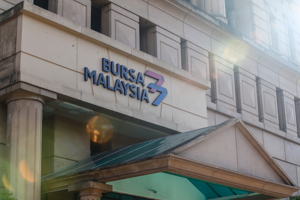 Bursa Malaysia ends lower as late selling hits blue chips