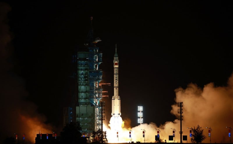 China launches three-person space mission in push for Moon landing
