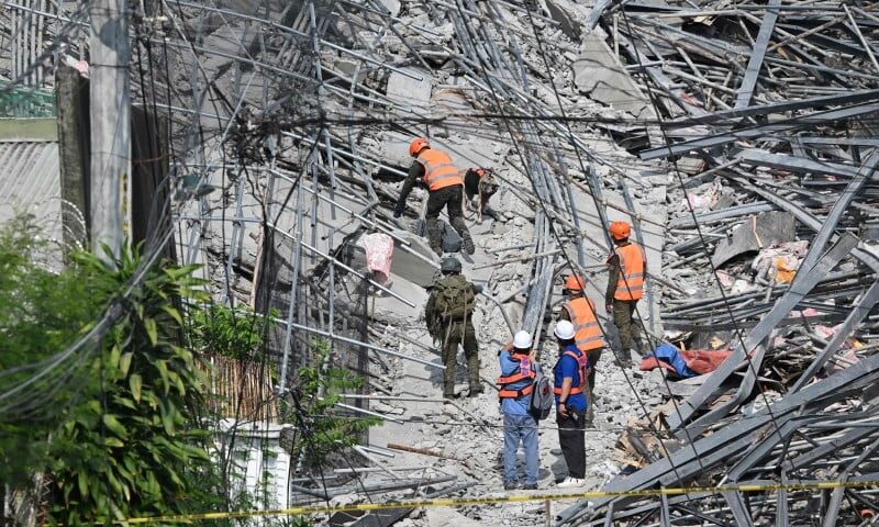 Philippine construction collapse toll hits four, over dozen missing