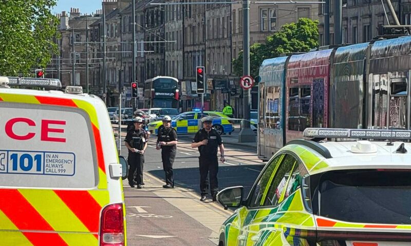 Edinburgh tram hits pedestrian closing large section of major road Leith Walk