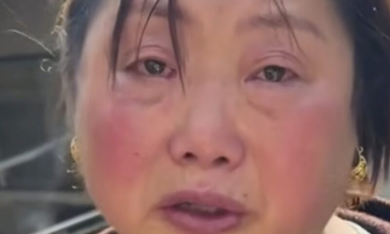China official mocked for wearing gold earrings while crying about local flood disaster