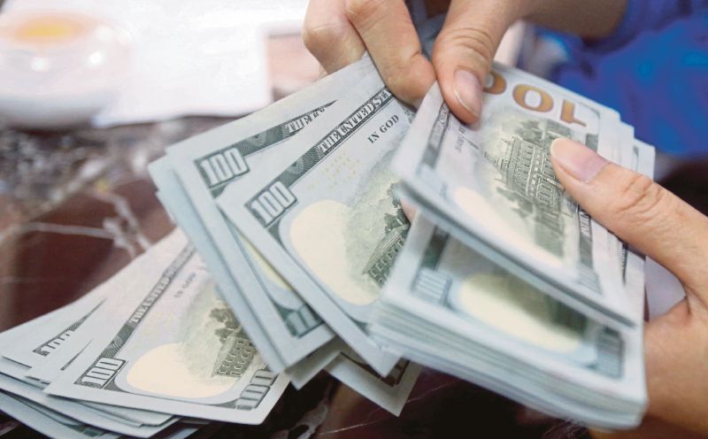 Dollar slumps as signs of deal to reopen Hormuz spur risk appetite