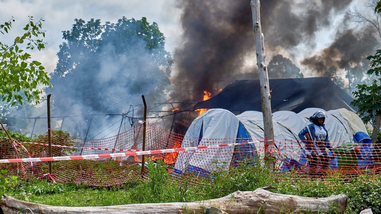 DR Congo police fire warning shots as protesters burn Ebola patient tents