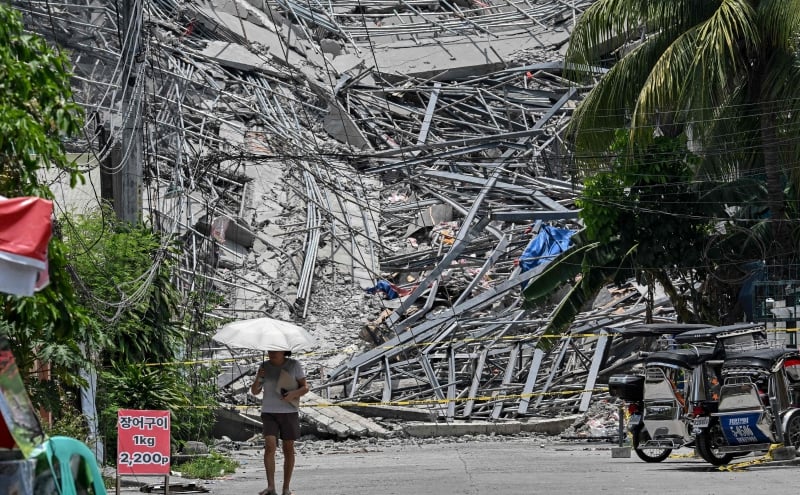 Philippines ends rescue efforts as hope fades for victims of building collapse