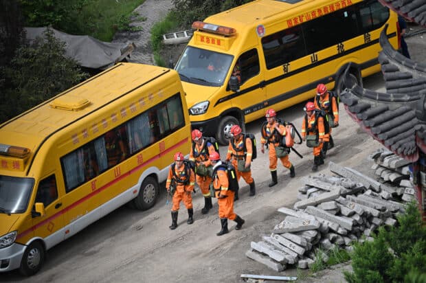 China rescuers search for missing after mine blast kills 82