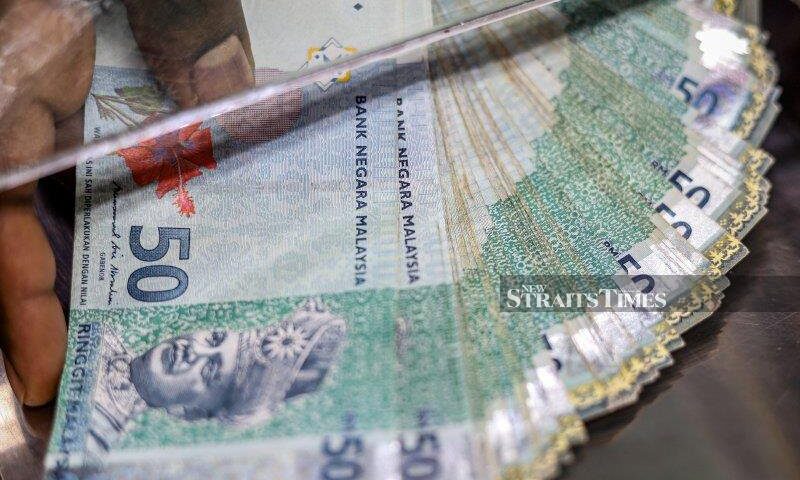 Ringgit opens higher against greenback on improved sentiment