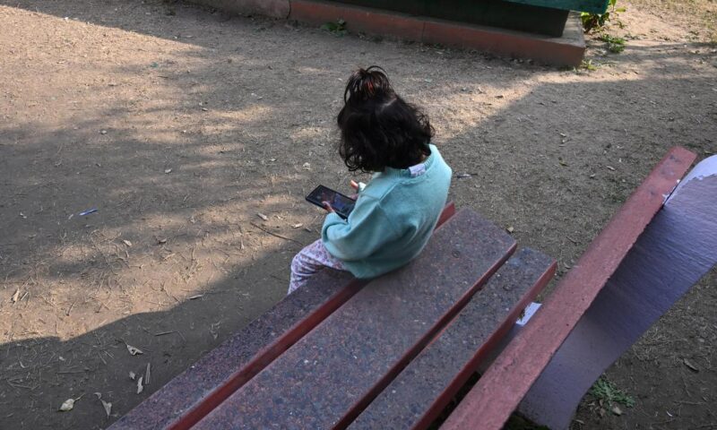 Social media as bad for children as smoking, British doctors say