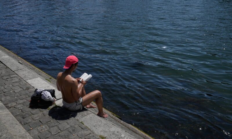 Parts of Europe swelter in record May heat as deaths at amateur sports events spur warnings