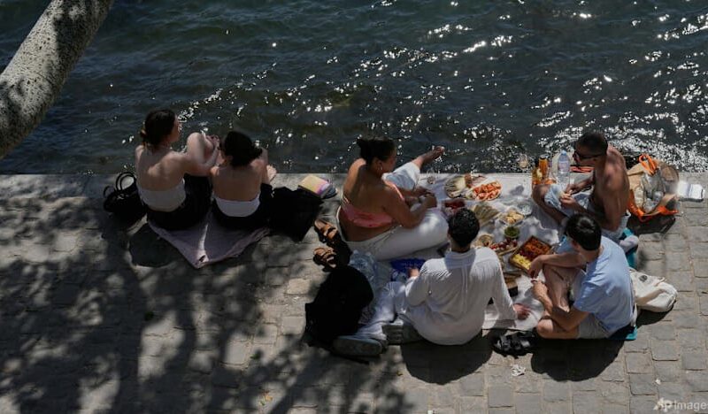 Parts of Europe swelter in record May heat as deaths at amateur sports events spur warnings