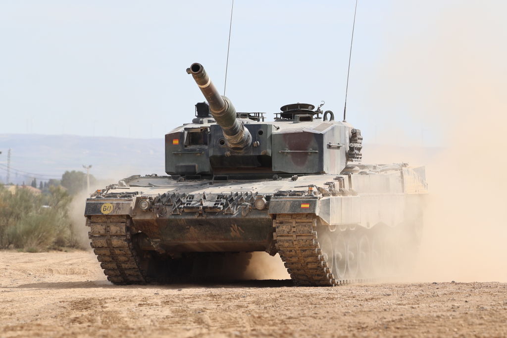 Spaniards back stronger defence, but see economy as key to security, survey shows