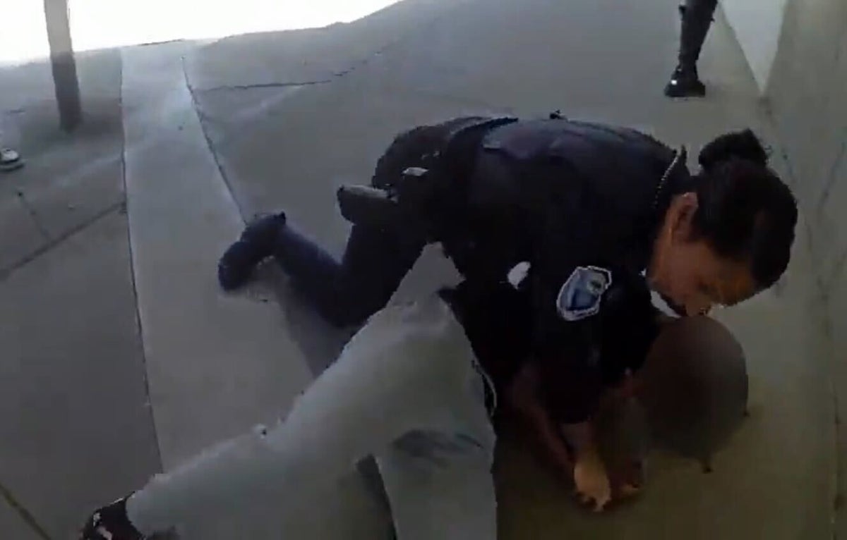Investigation into California cop after footage of her hitting teenage boy at high school went viral