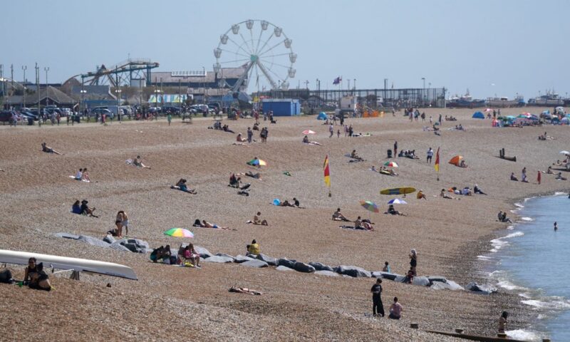 Man dies on packed beach on hottest day of the year after ‘medical emergency’
