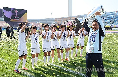 Coach for N. Korean women’s football club thanks country for support after winning Asian title