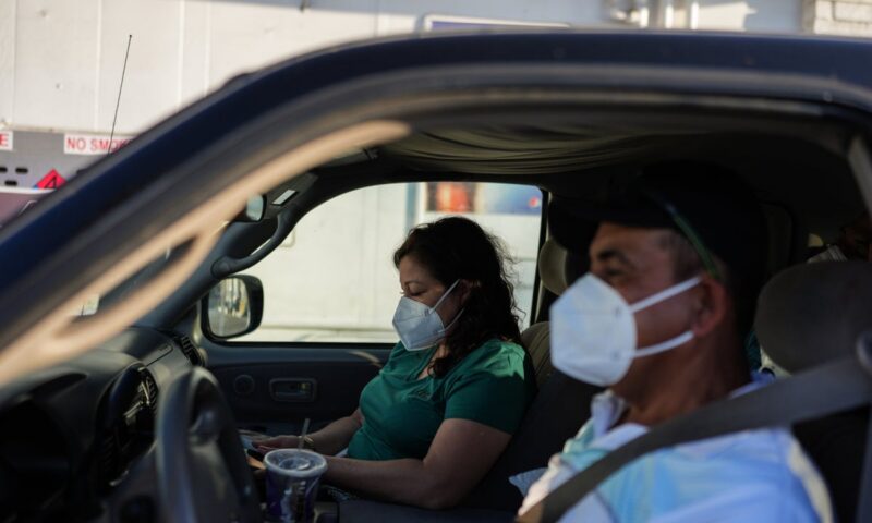 Thousands return home after California chemical tank threat, but fears linger