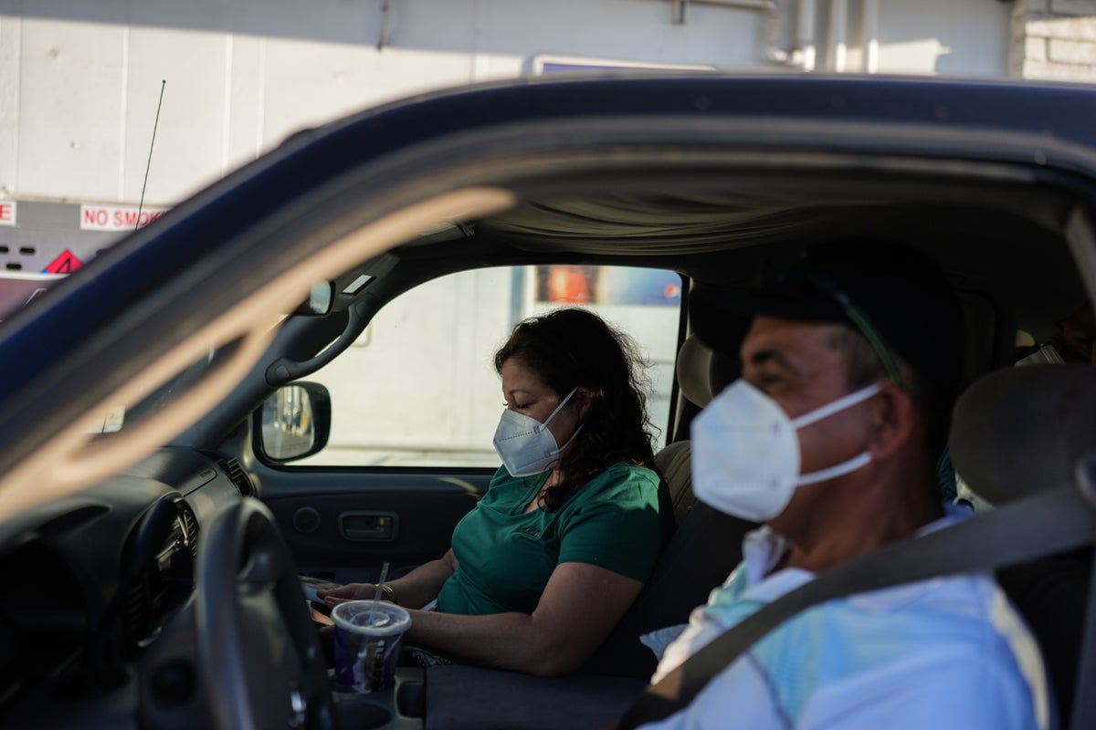 Thousands return home after California chemical tank threat, but fears linger