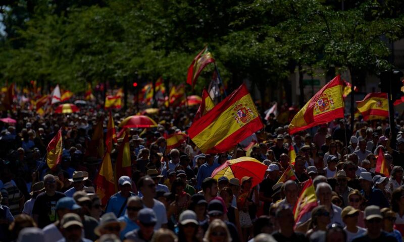 Tens of thousands march in Madrid to demand Spanish Prime Minister resigns