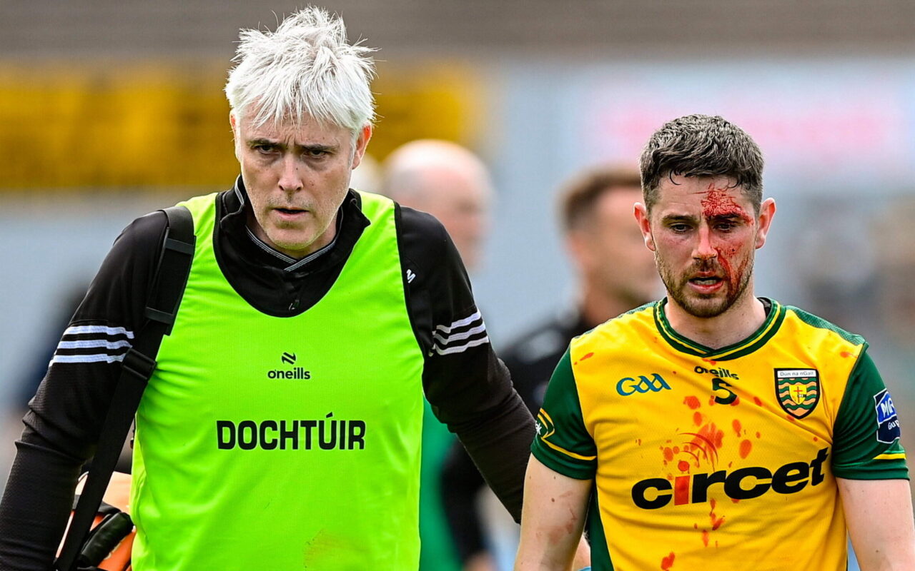 Fourteen-man Kerry left battered, bruised, down if not quite out by Donegal in spiky All-Ireland opener
