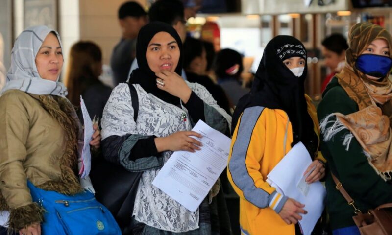 Homesick Filipino migrants count cost of separation for a ‘better’ future