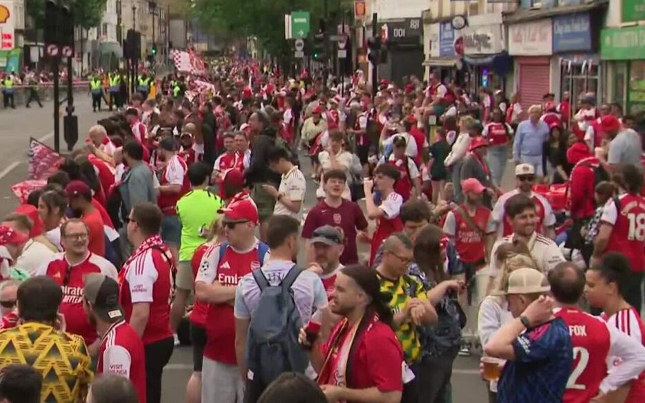 Arsenal fans line the streets in North London ahead of Premier League trophy parade