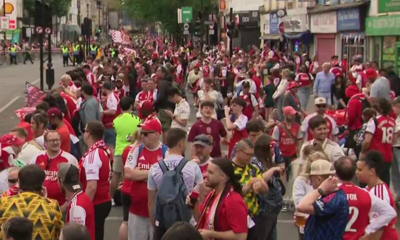 Arsenal fans line the streets in North London ahead of Premier League trophy parade