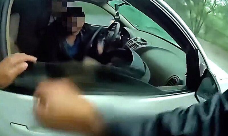 Baby pulled from vehicle trapped in raging floodwaters in dramatic rescue caught on video