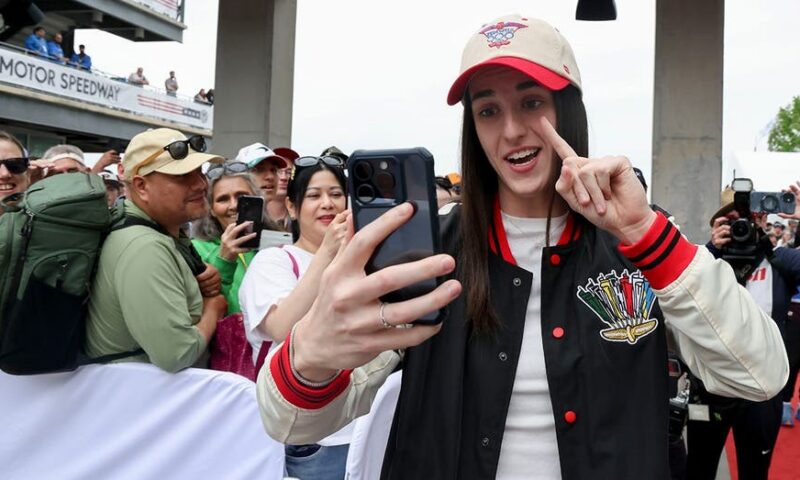 Indy 500 fans clamor for Caitlin Clark as she takes center stage at race