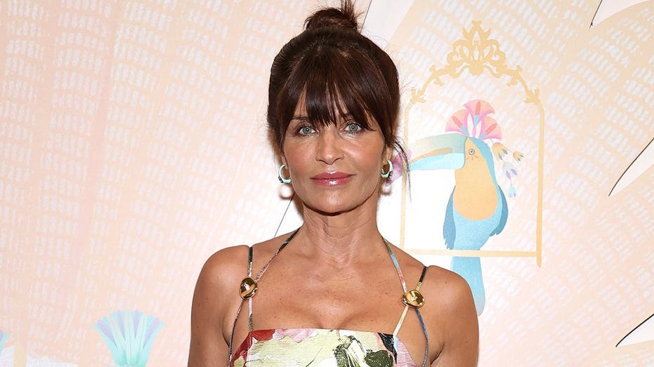 Helena Christensen soaks up the sun in strapless swimsuit after turning heads at Cannes Film Festival