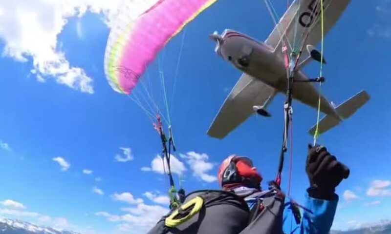 Plane crashes into paraglider and sends her spiraling through the air