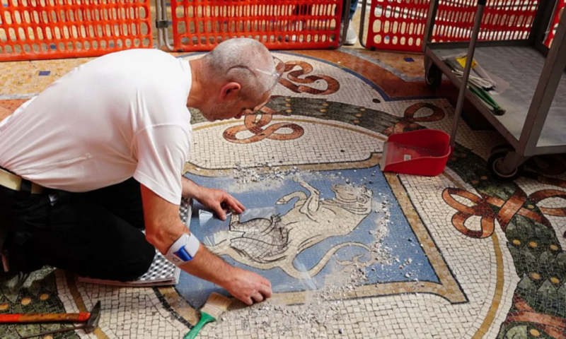 Italy restores lucky testicles on bull mosaic worn down by tourists