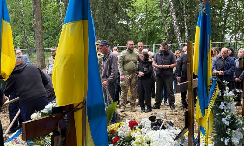 Funerals, beauty queens and bombs: The Ukrainian city that won’t let Putin win